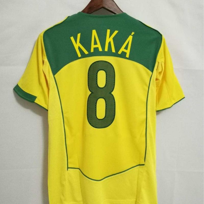 Ronaldinho's 2004 Brazil Home Vintage Football jersey featuring Ronaldinho's short sleeved print commemorative football