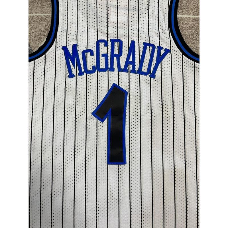 Tracy McGrady's No. 1 retro white basketball jersey is available for both men and women  making it a highly collectible piece for basketball enthusiasts